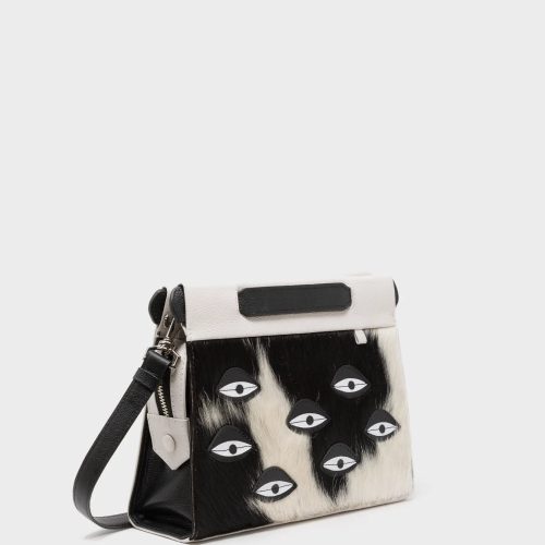 Vali Crossbody Small Cream Leather Bag - Eyes Applique Adjustable Handle - Front corner angle view